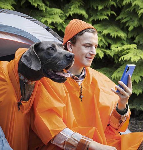 Man looking at his phone making a return