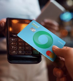 Hand holding currency card 