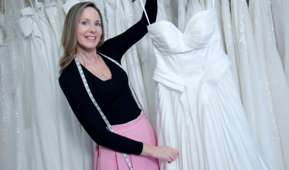 Woman holding a wedding dress